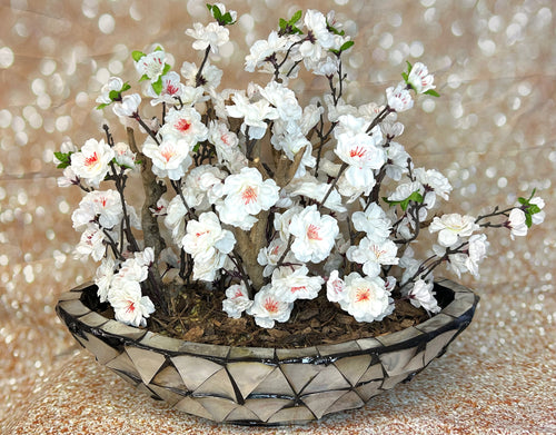Künstliche Blumen mit Vase
